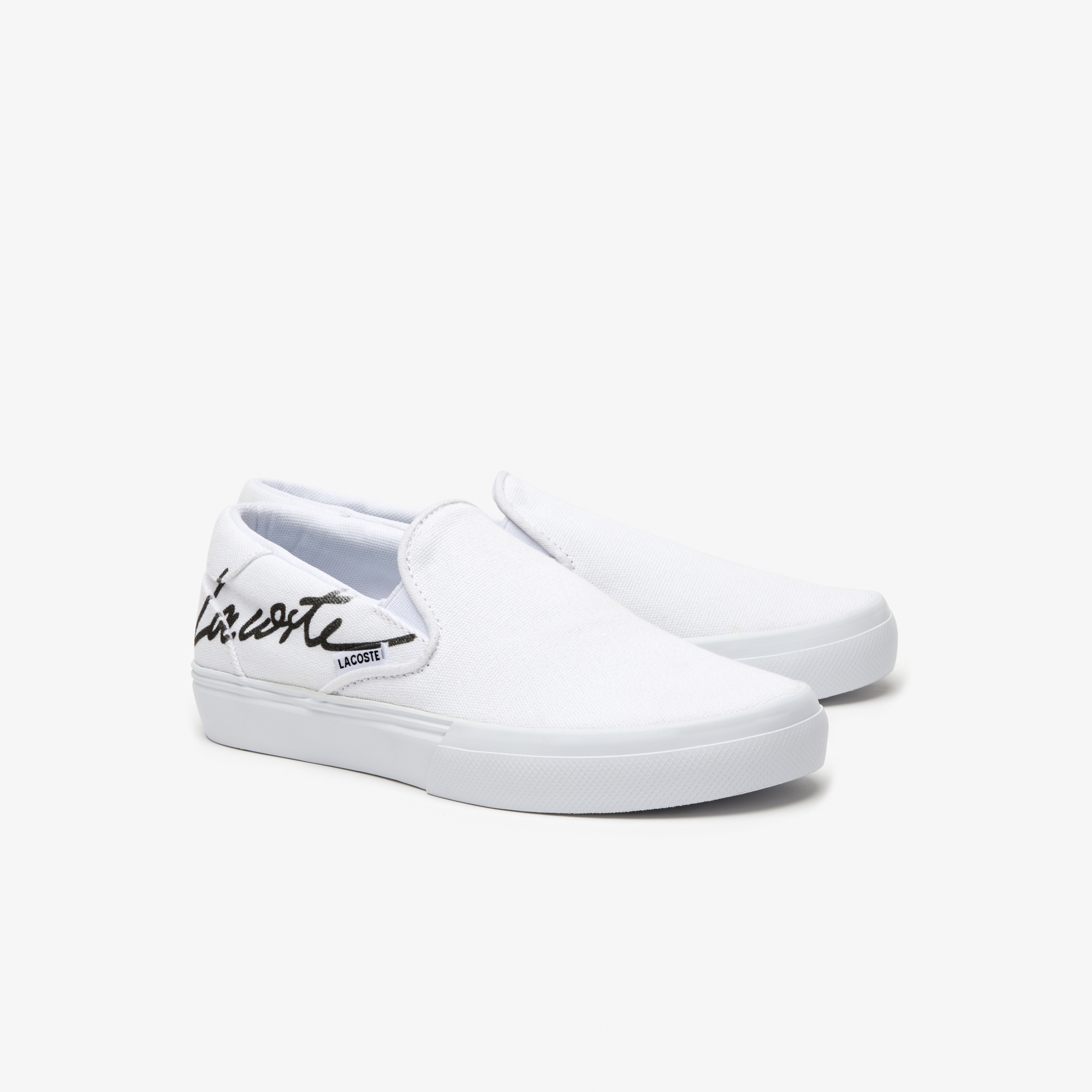 Lacoste canvas top slip on shoes