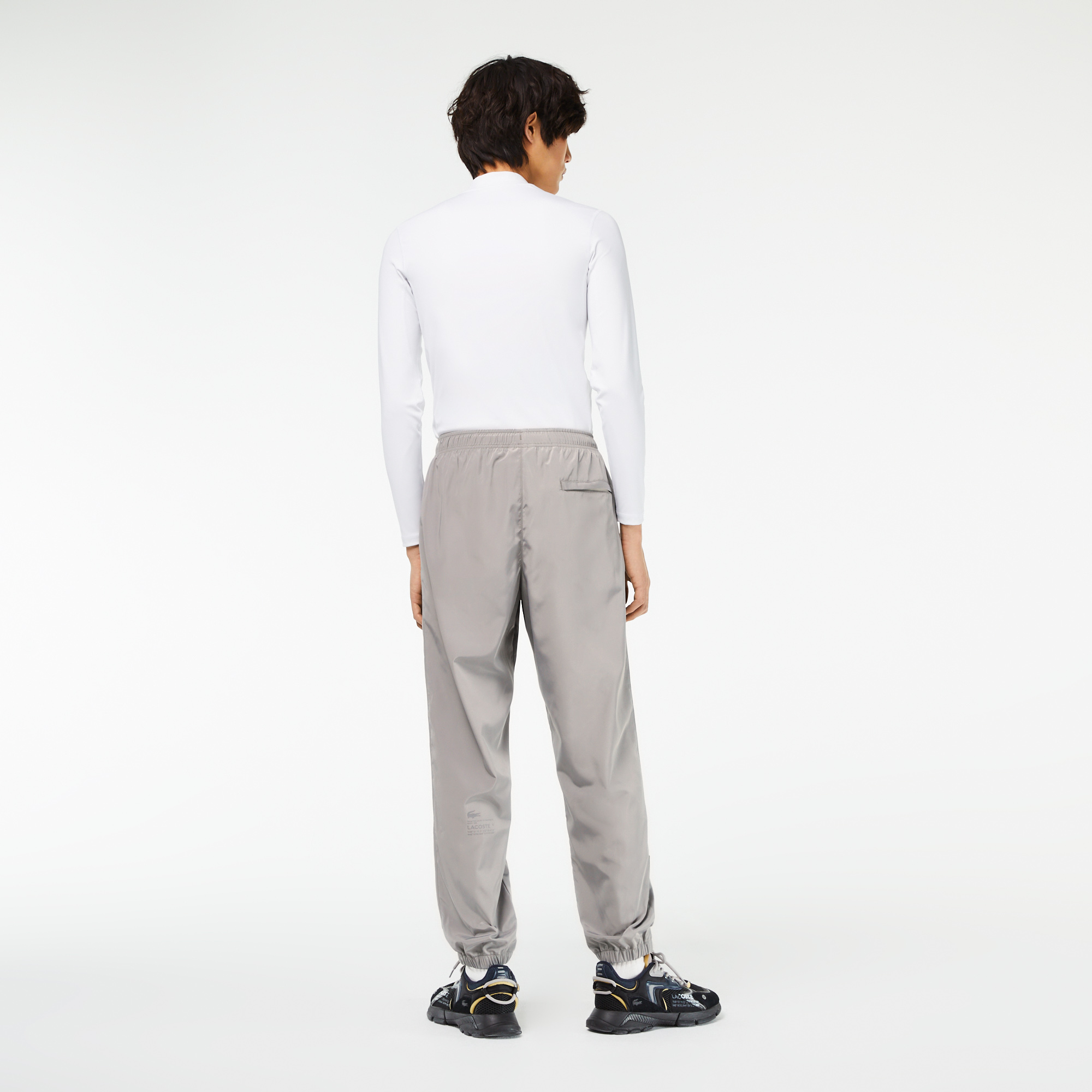 Grey lacoste guppy 2024 track pants